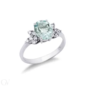 Anello in Oro bianco 18k con Acquamarina e 6 diamanti per lato