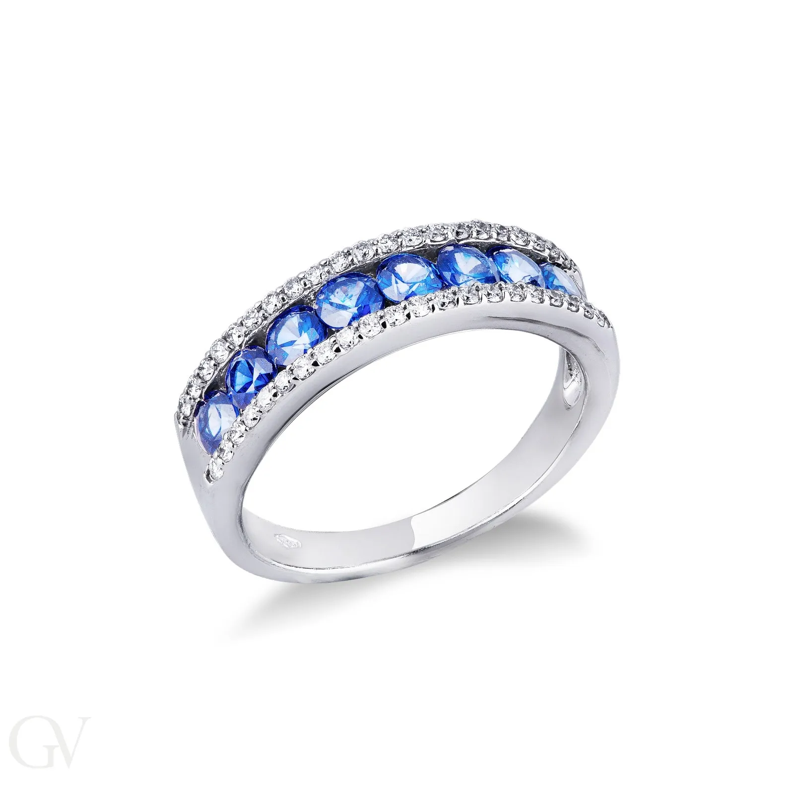 Anello in oro bianco 18k con fila centrale in Zaffiri blu e Diamanti