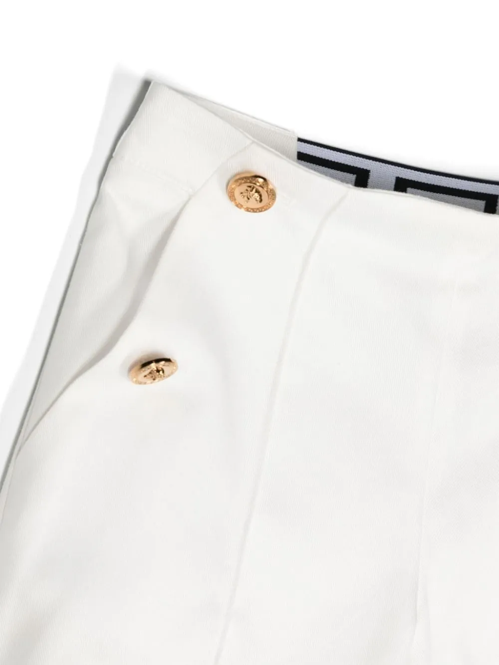 Shorts con testa di Medusa